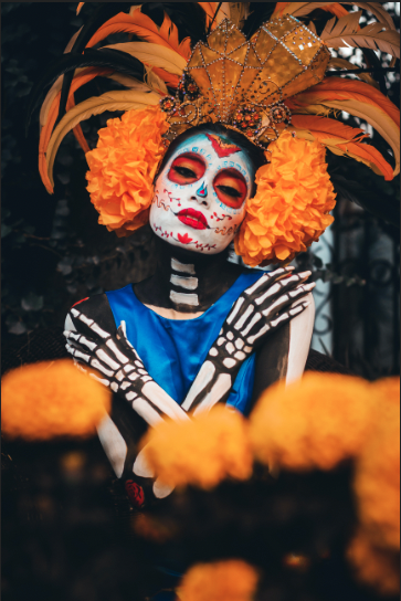 A image of women in a costume for day of the dead. With color enhance Brightness and Contrast