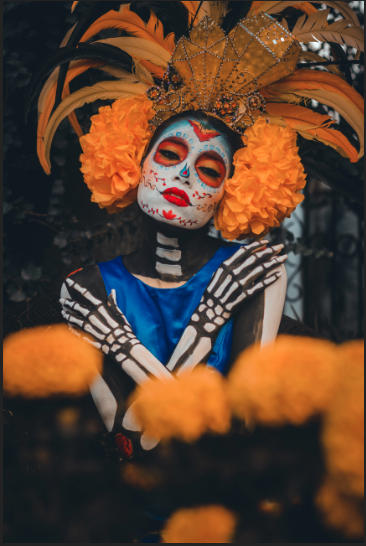 A image of women in a costume for day of the dead. With color enhance using HSL 