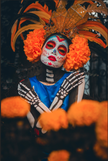 A image of women in a costume for day of the dead. With the colors enhance with the Vibrance